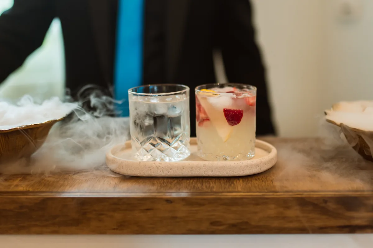 Two signature cocktails with smoke