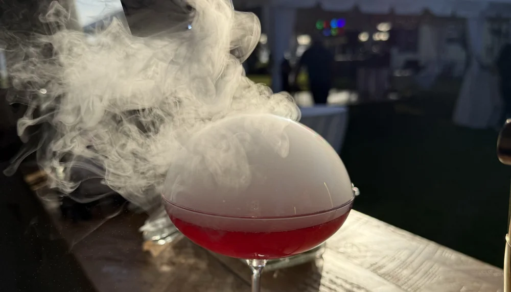 Smoke bubble cocktail at sunset